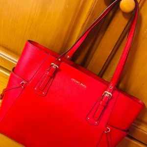 Red Michael Khors purse